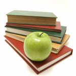 Books and apple