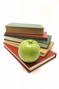 Books and apple
